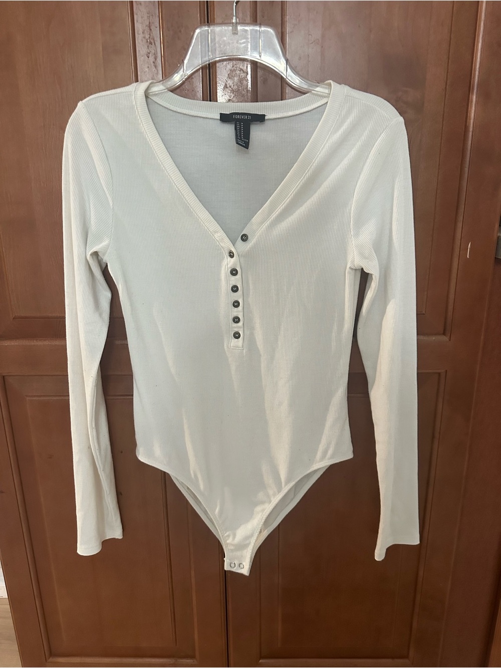 Forever 21 Cream Ribbed Long-Sleeve Henley Bodysuit